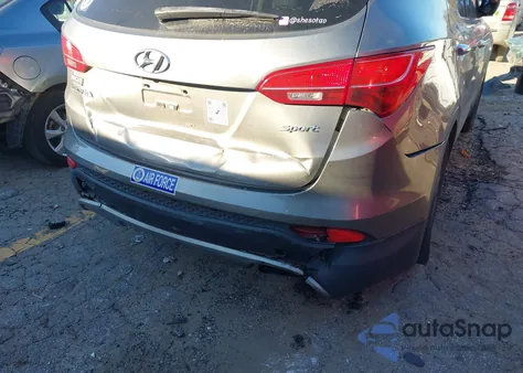 2014 Hyundai Santa Fe Sport 2.4L z USA, uszkodzony, nr VIN 5XYZU3LBXEG181085